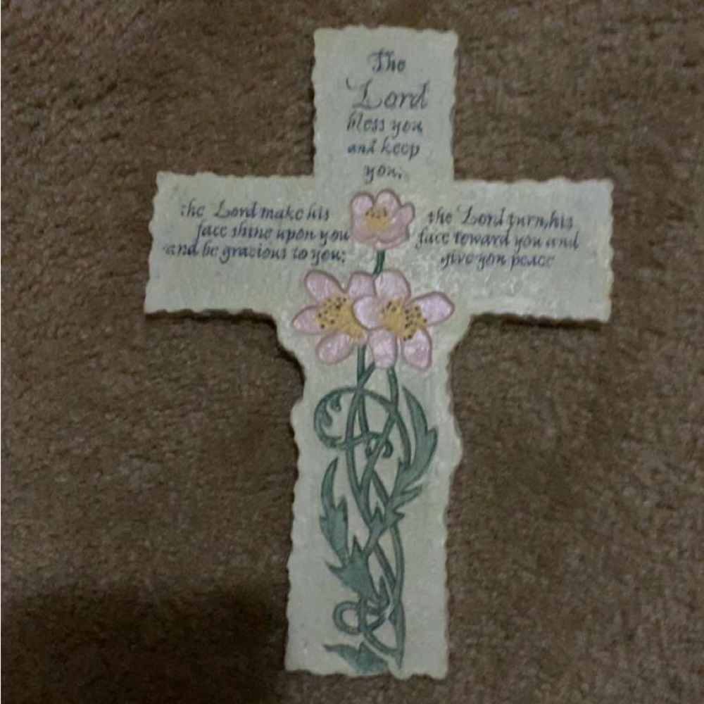 Cross with saying and flower on it